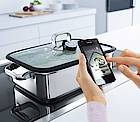 Kochen via Smartphon: Alles, was es zur neuen Koch-Einfachheit braucht, ist ein Dampfgarer der Serie „WMF Vitalis“, den Sensor und die App des WMF Cook Assist